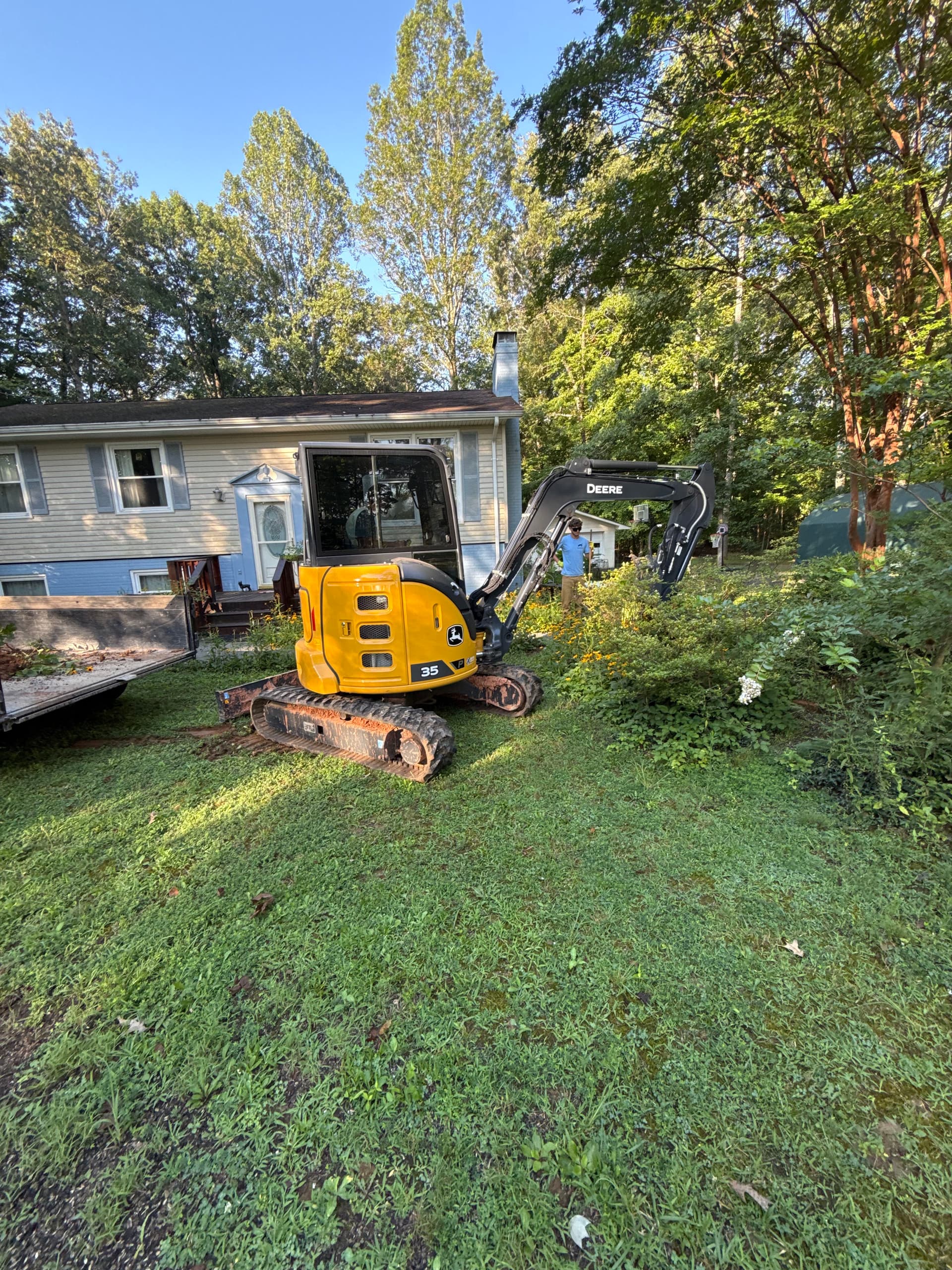 Overgrown Landscape Beds Cleared Down to a Clean Slate