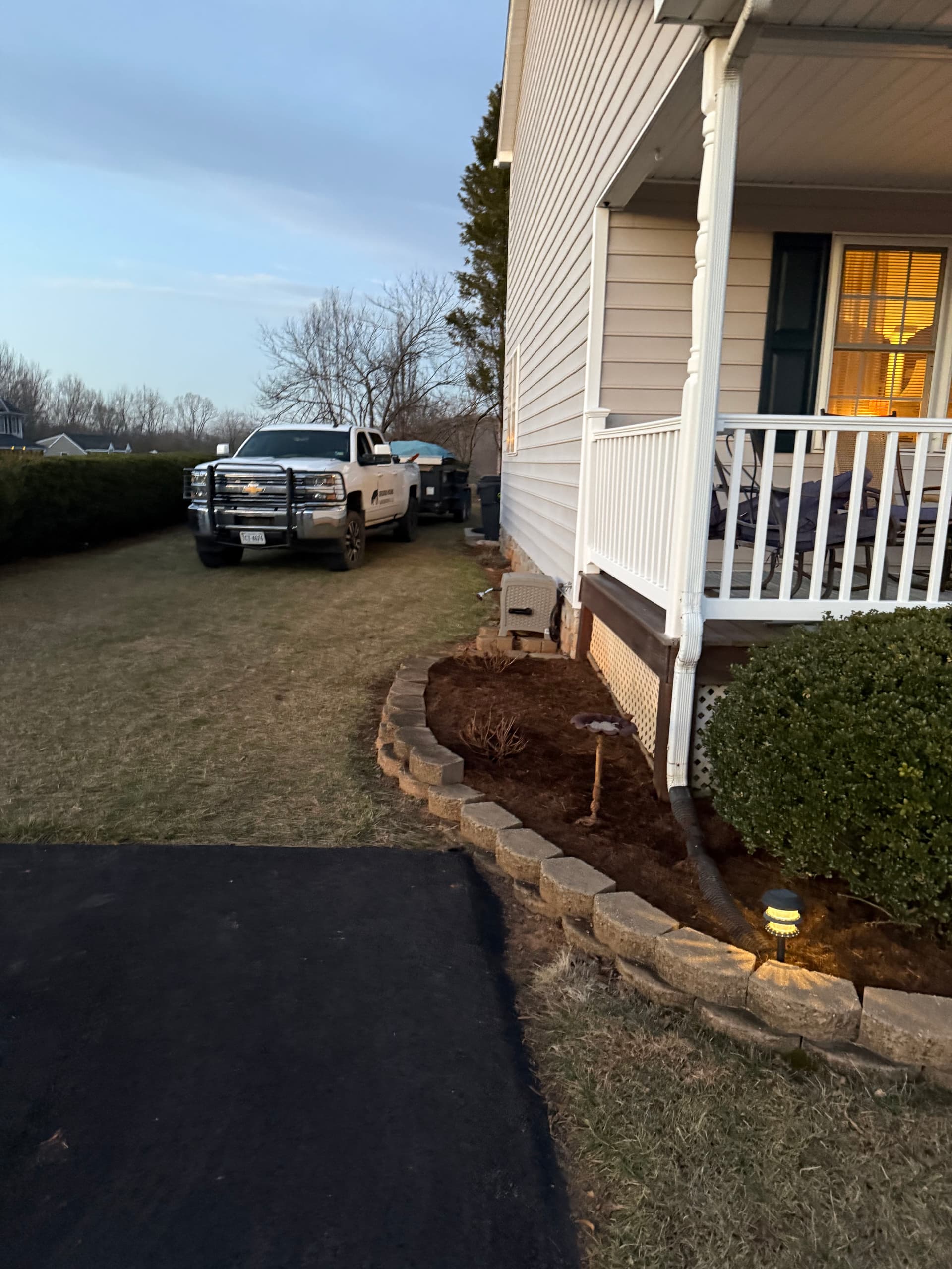 Garden Bed Revamp with Fresh Mulch and New Plantings