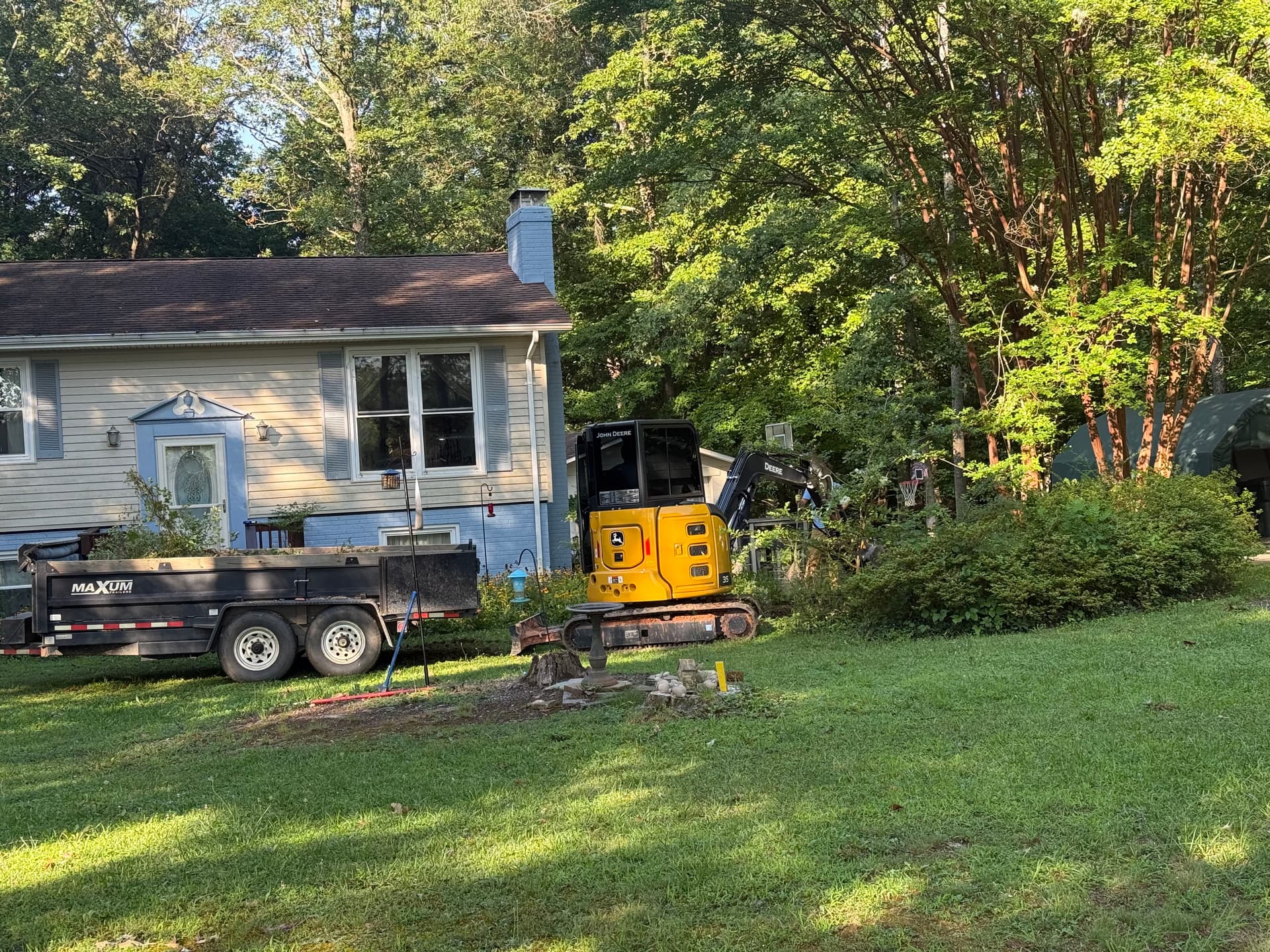 Overgrown Landscape Beds Cleared Down to a Clean Slate